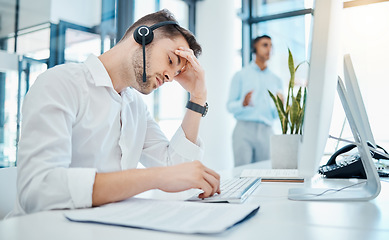 Image showing Stress, anxiety and tired customer service or call center agent working with a computer. Telemarketing consultant or worker suffering mental health, burnout and headache in an sales retail office