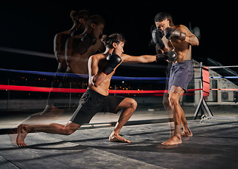 Image showing Sport, boxing and fight with a boxer and coach training for health, fitness and exercise in a ring at the gym. Workout, sports and cardio with a coach and student fighting for health and cardio