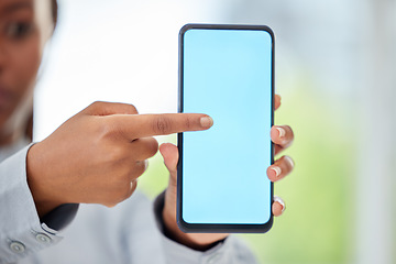 Image showing Hand of business woman with mockup phone for contact us advertising of 5g network company with blue screen copy space. Corporate black woman working in marketing field pointing at blank smartphone