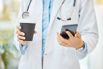 Image showing Female doctor, phone and coffee break with medical healthcare worker reading message, social media notification and online news. Closeup hands of gp using a mobile app with 5g wifi network connection