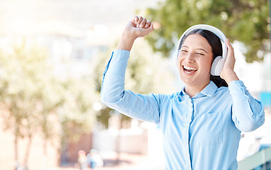 Image showing Headphones, dance and business woman at park, in nature or outdoors with mockup. Audio, streaming or corporate female with earphones or headset dancing while listening to radio, podcast or music.