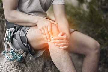 Image showing Knee, injury and pain with a man sitting on a rock to take a break while out hiking, rock or mountain climbing in nature. CGI of discomfort from cramp during exercise or sports training in a forest