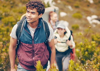 Image showing Hiking, friends and adventure with a group of young people wearing backpacks during travel, adventure and nature journey. Active, fitness and exercise with a happy man trekking to explore with mates