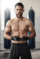 Image showing Boxing, strong and boxer man portrait in training workout or fitness gym. Muscle strength, body goals and determined personal trainer athlete during his exercise for healthy motivation or mma sports