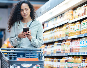 Image showing Supermarket, phone and woman shopping, search and on internet for grocery store product, drink or juice. Customer on 5g technology fintech app for buying healthy or wellness food in inflation economy