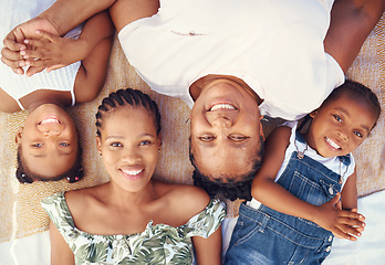 Image showing Black family portrait with mother, grandma and children relax for summer vacation, holiday or happy break in sunshine. Big family and kids face smile together lying on ground at beach from above