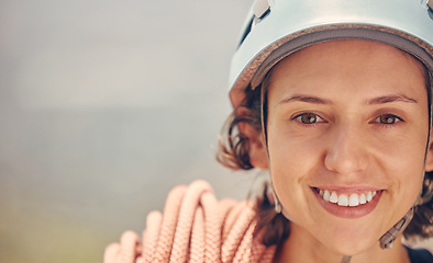 Image showing Portrait of a happy woman hiking with helmet and ropes outdoors before climbing mountain or rock. Healthy, fitness and extreme climber face with a smile with motivation and love for extreme sport