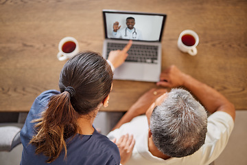 Image showing Telehealth doctor, video call laptop and patient consulting, help advice and virtual healthcare, medicine service and expert feedback. Above of people talking to online clinical surgeon over internet