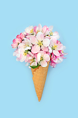 Image showing Surreal Ice Cream Cone with Apple Blossom Flowers
