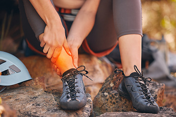 Image showing Pain, injury and ankle with a woman hiking and suffering from a sprain, strain or inflammation with cgi special effects. Sports, fitness and exercise with a female getting injured on a workout