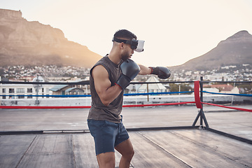 Image showing VR boxing, metaverse fitness and man with innovation sports training for wellness in city, digital futuristic 3d workout and exercise with tech for health. Boxer in ring with virtual game challenge