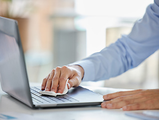 Image showing Businessman, laptop and covid sanitizer wipe for cleaning keyboard bacteria, virus or stop to global healthcare crisis. Zoom on worker hands, security or employee safety compliance in company office