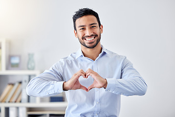 Image showing Asian businessman, heart sign and hand gesture emoji for support, trust and passion for success. Portrait of smile, happy or motivation worker for charity, community love or help for people in office