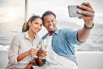 Image showing Couple, selfie and toast on a yacht with a phone for celebration, anniversary and luxury together. Champagne, happy and sailing with young man and woman, smile for a picture for summer holiday