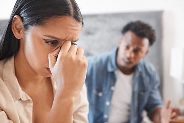 Image showing Divorce, stress and couple fight on a bed, noise and conflict with toxic man and woman. Interracial relationship issue with young husband and wife in conflict, breakup and abuse bedroom problem