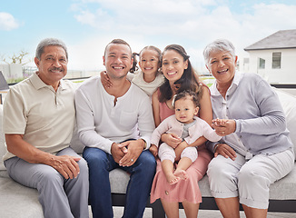 Image showing Big family portrait, children with grandparents at summer holiday vacation on sofa with blue sky. Happy Mexico mother, interracial father and kids or baby bonding together on outdoor patio break