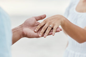 Image showing Engagement proposal, couple hand and marriage ring on vacation at beach, travel wedding and love celebration on sea vacation in Bali. Man and woman with jewelry for commitment at the ocean in summer