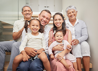 Image showing Happy family, portrait and grandparents with baby girls bonding and relaxing together in a peaceful home. Grandfather, grandmother and mom sitting by dad with smiling children or kids in the house