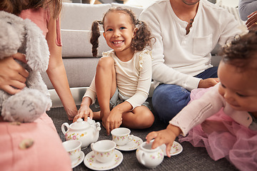 Image showing Happy, kids and children at play date have tea party, fun and playing together on home living room floor. Development, youth and group of little girl friends imagine theyre a princess at royal party