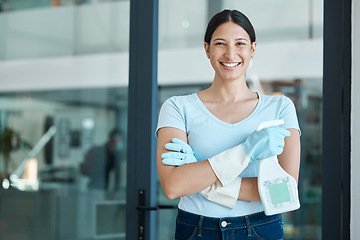 Image showing Cleaning service, portrait and cleaner in an office with spray bottle of disinfectant, bleach or detergent. Happy, smile and young female worker with gloves and soap liquid done washing glass windows