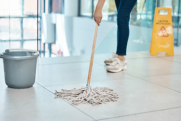 Image showing Woman cleaner mop floor at office, with water in plastic bucket and put sign as warning or caution for staff. Employee janitor clean building put danger signal, as service to company or business.