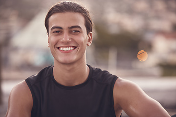 Image showing Sport man from Portugal about to start fitness, exercise and training outdoors. Portrait of a happy, strong and healthy smile of a young athlete after a cardio sports workout relax with happiness