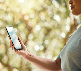 Image showing Phone, woman hands and park or sustainability environment with trees bokeh and online search for eco friendly information on mobile app. Sustainable, wellness person with smartphone carbon footprint