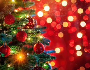 Image showing christmas tree closeup with bokeh lights copyspace