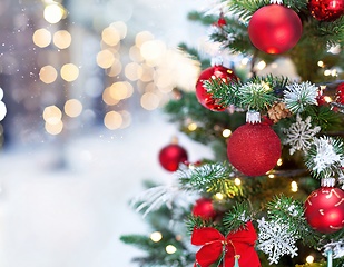 Image showing christmas tree closeup with bokeh lights copyspace 