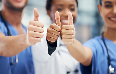Image showing Doctors, nurses or thumbs up hands in success, teamwork collaboration or trust with medical winner goal. Zoom on thank you, motivation and vote sign on man and support women in healthcare hospital