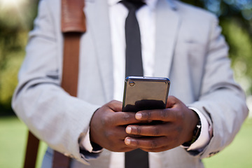 Image showing African accountant businessman hands with phone on social media or reading news on corporate finance and success strategy. Black management employee of digital technology and network mobile company