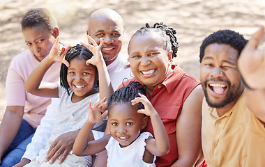 Image showing Portrait, happy black family and smile for selfie sitting and bonding in free time together in the outdoors. African father taking a silly photo with kids, wife and grandparents on a summer vacation