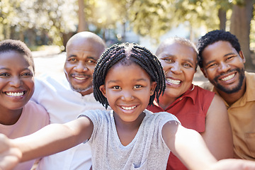 Image showing Black family, selfie and smile of child taking a picture with her parents and grandparents outside at a park in nature. Portrait of a girl having fun, love and bonding with family feeling happy