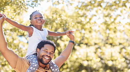 Image showing Happy, playful and fun father and girl in their backyard on a sunny day. Portrait of energetic dad playing and bonding with his child. African family smile and spend time together on the weekend