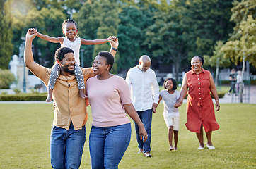 Image showing Generation of happy family walking in park, garden and summer nature outdoors to relax, bonding during quality time. Black people with grandparents, parents and children in love, care and support