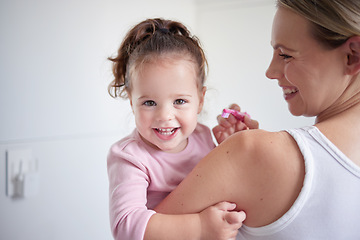 Image showing Mother teaching happy girl dental hygiene, baby toothbrush and mom holding kid. Clean teeth, home healthcare and portrait of child growth. Laugh in children bathroom, healthy mouth and natural smile