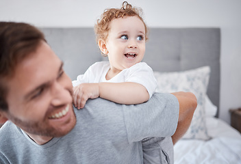 Image showing Family, love and playful man and his baby bonding in the bedroom of their home together. Children, kids and father with a single parent and his son on a bed inside their house on the weekend