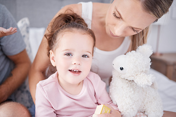 Image showing Face portrait of happy girl with mother, love and bonding in bedroom of home. Family, childhood and caring woman with little kid or child smiling, spending free time together and playing in the house