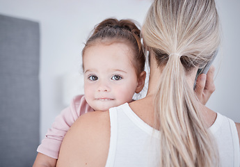 Image showing Baby, communication and mom talking in phone call conversation while multitasking on business call. Work from home single mother holding a little girl, child or kid while speaking on a mobile