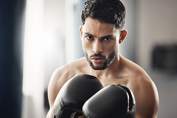 Image showing Boxer training, cardio fitness and boxing at gym for exercise, motivation for sports workout and sport for health wellness at club. Face portrait of athlete with commitment to fight competition