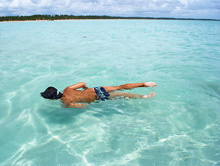 Image showing Swimming in crystalline clear waters in Maragogi,  Brazil