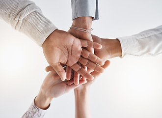 Image showing Teamwork hands, partnership and collaboration support for winner, motivation and vision of goals. Below business group people connect in trust, success commitment and working for solidarity together