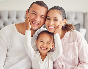 Image showing Happy family, morning bonding and love from child with mother and father in their bedroom after waking up and wearing pajamas. Portrait of man, woman and daughter showing smile and close bond at home