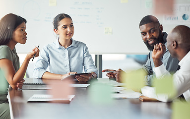 Image showing Corporate people and meeting in office for strategy plan in glass wall boardroom with sticky notes. Diverse startup business team in conversation with ideas for development of company workforce.