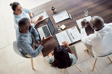 Image showing Business people in finance meeting with laptop, document report and notebook for company financial profit, strategy planning and marketing goal. Teamwork discussion and group manager KPI feedback