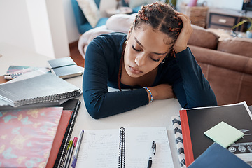 Image showing Burnout, tired and fatigue student sleeping at desk while studying for college, school or university exam. Woman scholarship scholar sleep while doing education research for project or assignment