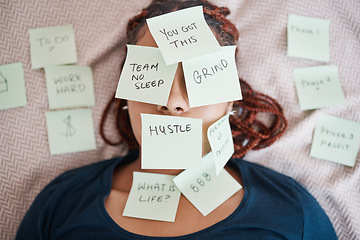 Image showing Tired, sticky note and sleeping woman in overworked, schedule or overwhelmed with work and tasks on bed. Female worker covered in paper, pressure and bedroom chaos or information overload at home