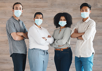 Image showing Portrait of diversity team with mask for covid safety, health or protection from bacteria, virus or covid 19. A group of people, staff or workforce standing together in solidarity and support