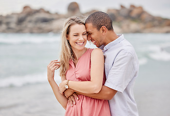 Image showing Travel, beach and couple hug, happy and laughing while bonding outdoors, enjoying the view of the ocean. Love, relationship and water fun with relax man and woman on seaside trip in San francisco