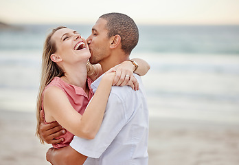 Image showing Beach couple love, hug and kiss for summer vacation, happy marriage and lifestyle together. Laughing woman, playful man and interracial relationship enjoying ocean travel, holiday break and happiness